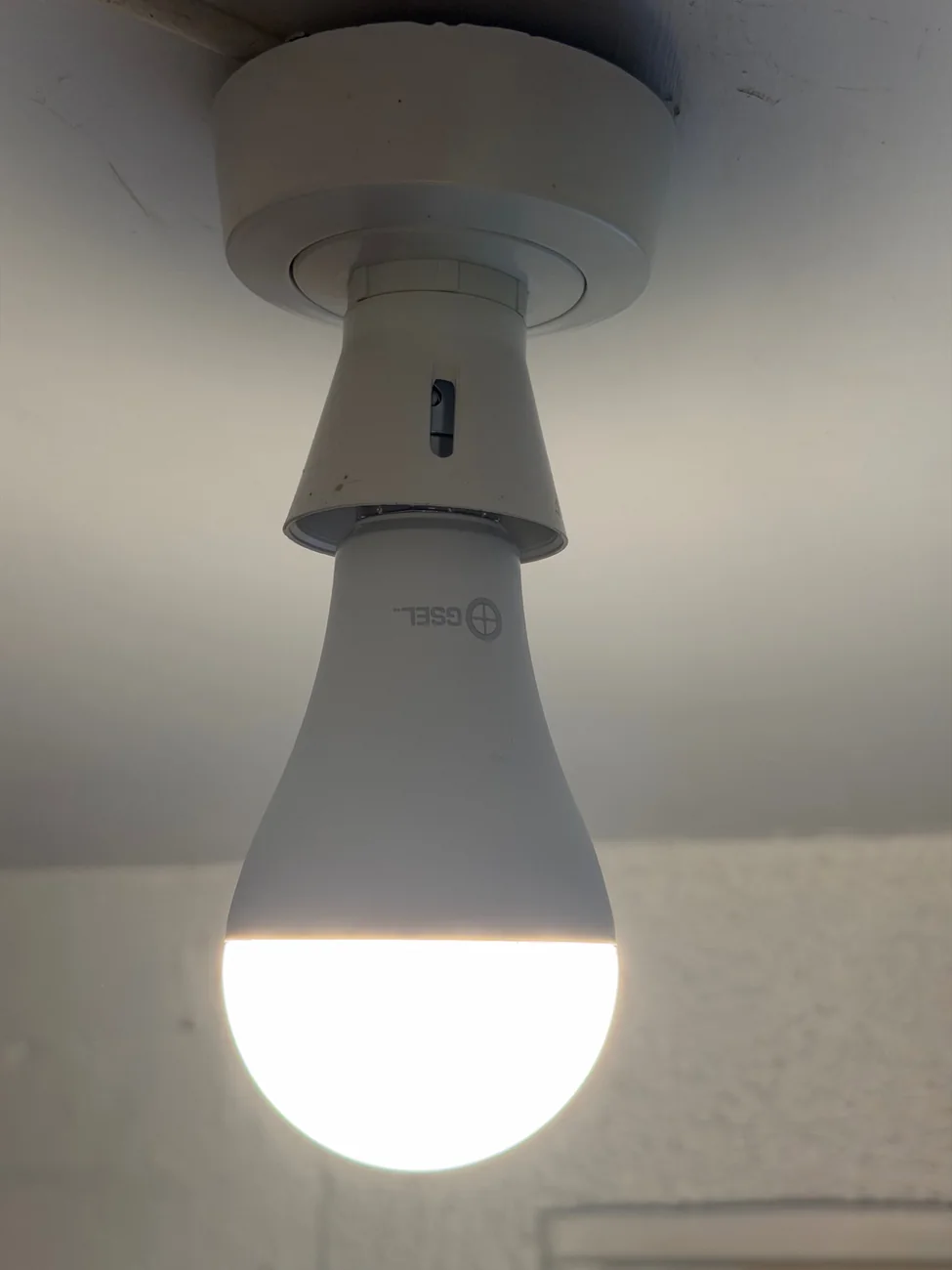 GSEL rechargeable emergency bulb illuminated in a compatible ceiling fitting